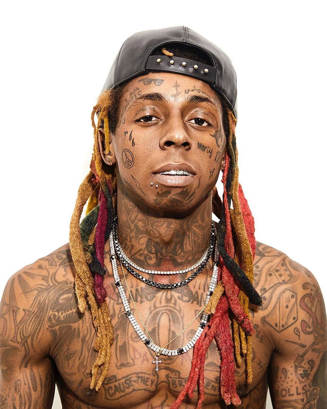 The Story Behind Lil Wayne's Teardrop Tattoos - Extra Chill