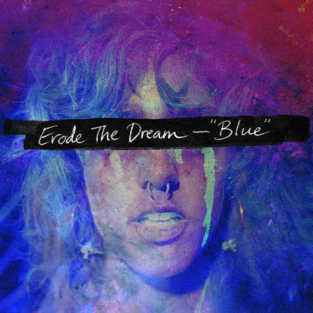 Portrait of a person in moody purple and blue tones with grainy, paint-like texture and streaks running from the eyes. A black strip across their eyes contains handwritten text reading “Erode The Dream — ‘Blue’.”.